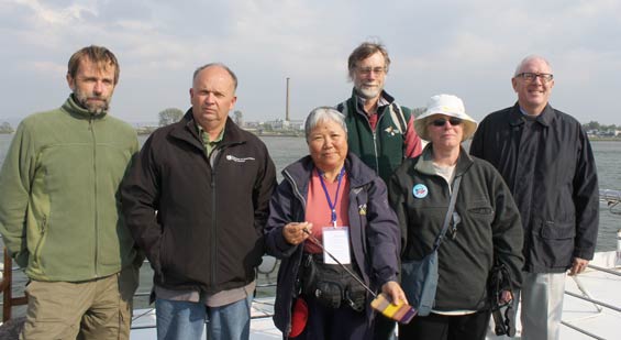 Pukorokoro Miranda Naturalists Trust and DOC with NZ Ambassador on the Yalu River, North China. L to R: Adrian Riegen - Vice Chair MN, Bruce McKinlay - DOC Techincal Advisor, Estella Lee - Councillor MNT, Keith Woodley - Manager of Miranda Shorebird Centre, Carol West - Director Terrestrial Ecosystems at DOC, HE Carl Worker - NZ Ambassador to China. © Bruce McKinlay Department of Conservation – New Zealand